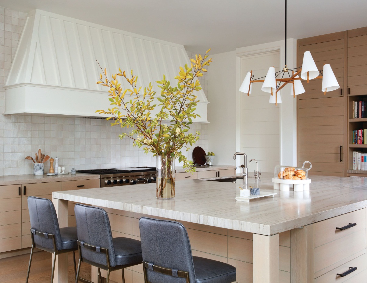 Lawson Fenning bar stools offer comfort and style around the kitchen island. PHOTOGRAPHED BY ROGER DAVIES