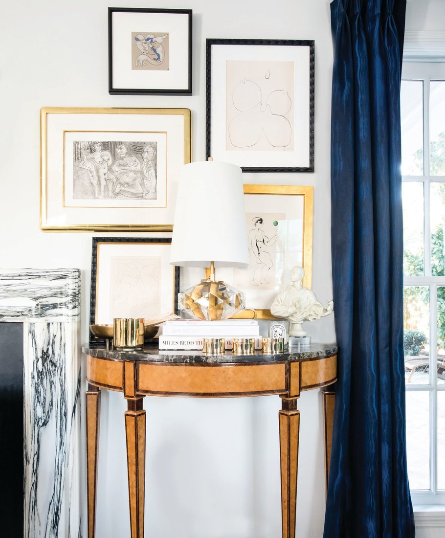 Vintage brass accessories and crystal lamps by Circa Lighting sit atop an antique Biedermeier console. PHOTOGRAPHED BY CHRISTOPHER STARK